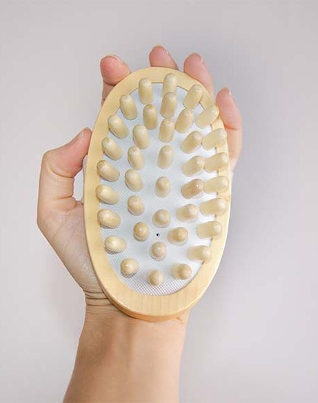 Cepillo de masaje madera